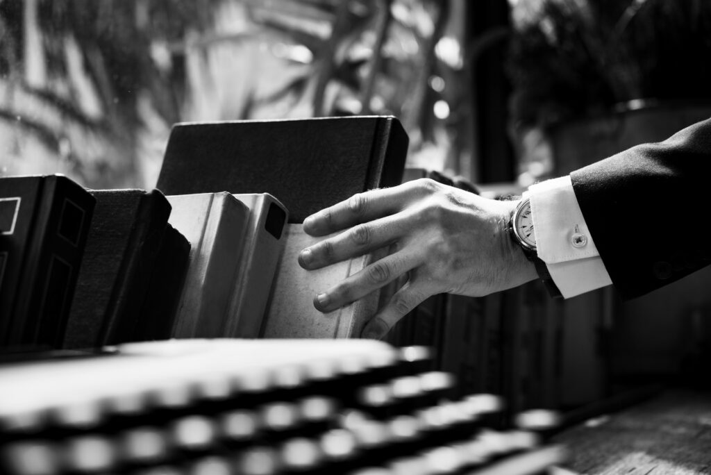 Closeup of hand getting a book